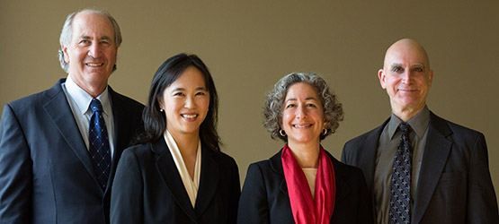 Photo of Barry Goldstein, Laura Ho, Linda Dardarian, and David Borgen